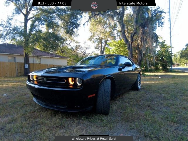 2017 Dodge Challenger  Challenger in front of Clock Tower Mall Used car business