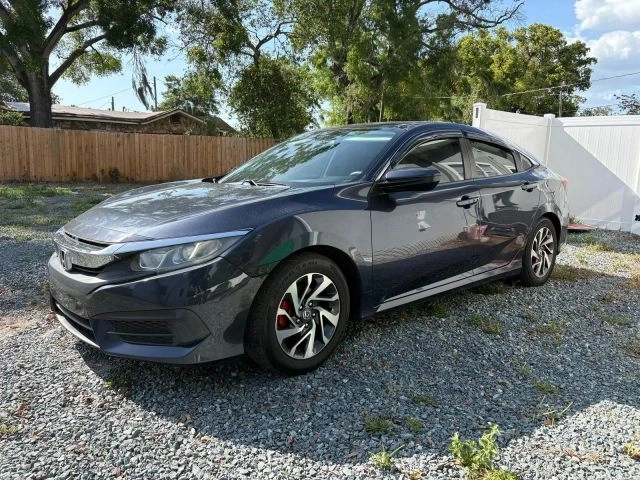 2017 Honda Civic  Civic in front of Clock Tower Mall Used car business